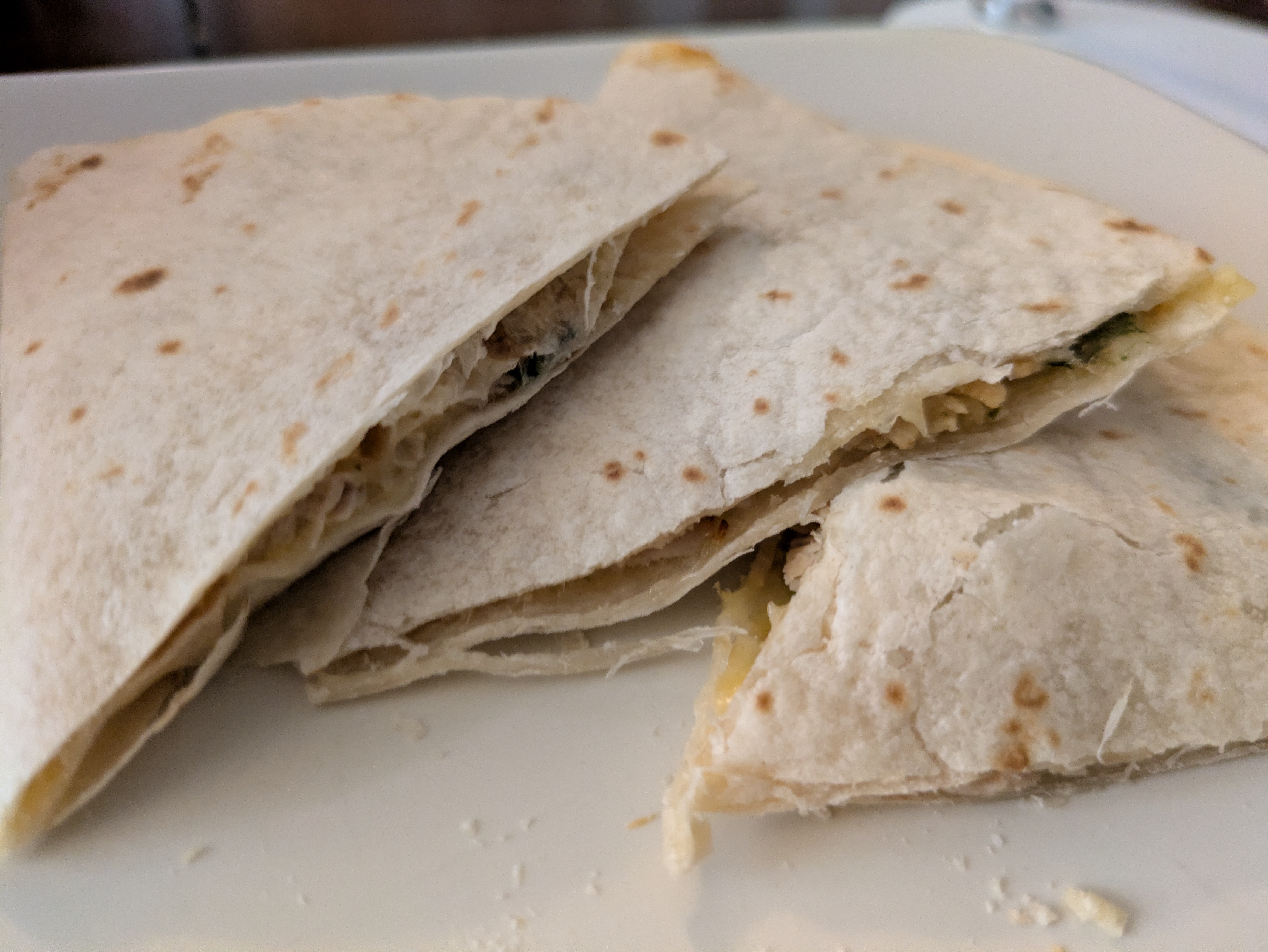 Tequila-lime marinated chicken thigh quesadillas with smoked Gouda and Monterey Jack